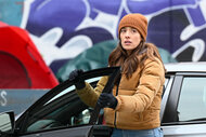 Kim Burgess stands outside of her car on Chicago Pd Episode 1103