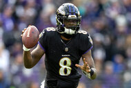 Lamar Jackson of the Baltimore Ravens during a play on the field