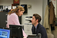 Jim and Pam smile at each other on the office episode 921