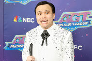 Kodi Lee poses on the red carpet of America’s Got Talent: Fantasy League
