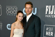 Justin Hartley and his daughter Isabella Justice Hartley pose together on the red carpet of the critics choice awards