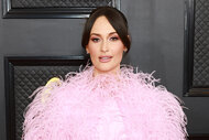 Kacey Musgraves wears pink feathers on the red carpet for the 2023 grammys