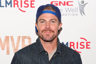 Stephen Amell wears a backwards hat at the FilmRise's "MVP" Red Carpet Premiere