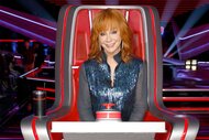 Reba McEntire sits in her coaches chair during The Voice Episode 2502