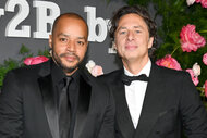 Donald Faison and Zach Braff pose together at the 2022 Baby2Baby Gala