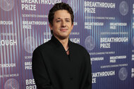 Charlie Puth poses on the red carpet of the Breakthrough Prize Awards and Ceremony