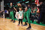 Jayson Tatum #0 of the Boston Celtics stands with his son Deuce Tatum prior to game seven of the Eastern Conference Finals against the Miami Heat at TD Garden on May 29, 2023