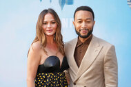 Chrissy Teigen and John Legend on the red carpet of Netflix's special screening of "A Man In Full" at Netflix Tudum Theater