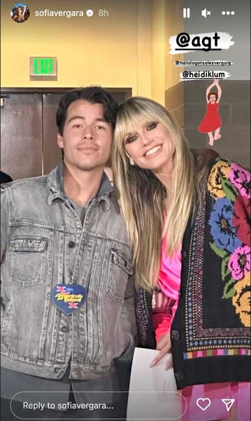 Manolo Vergara poses next to Heidi Klum on the America's Got Talent set.