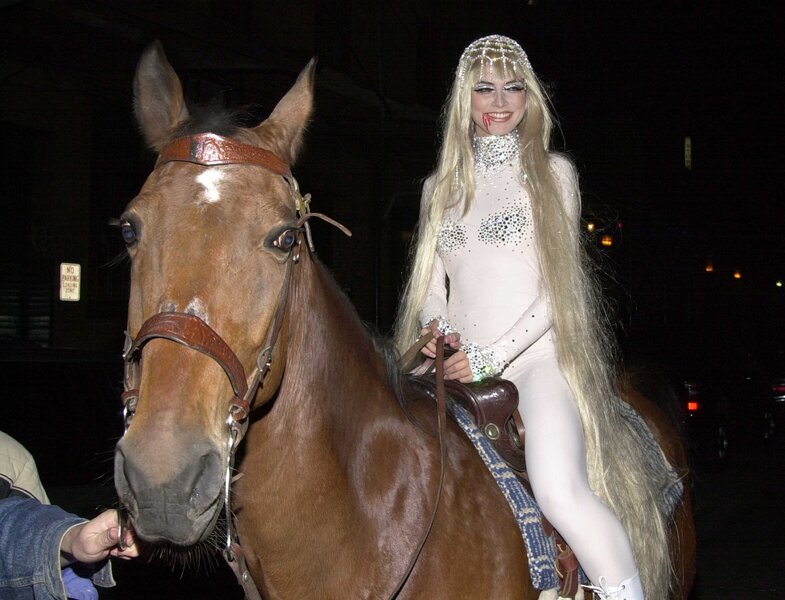 Heidi Klum riding a horse for her Halloween Party.