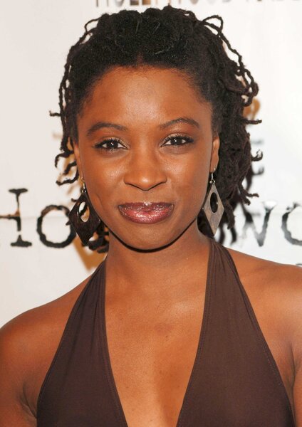Shanola Hampton smiling and posing for photos at a Young Hollywood event in 2005.