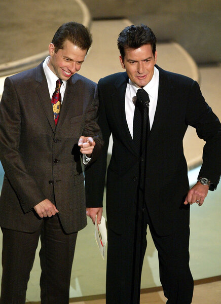 Jon Cryer and Charlie Sheen present an award onstage at the 56th Annual Primetime Emmy Awards