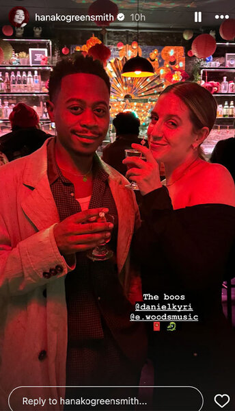 Daniel Kyri poses for a photo with a friend at a bar