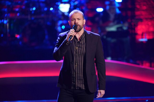 Neil Salsich performs on The Voice.