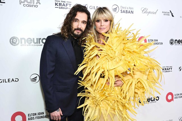 Heidi Klum and Tom Kaulitz posing at the Elton John AIDS Foundation's 31st Annual Academy Awards Viewing Party.