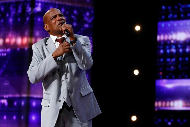 Archie Williams performing on stage on America's Got Talent.
