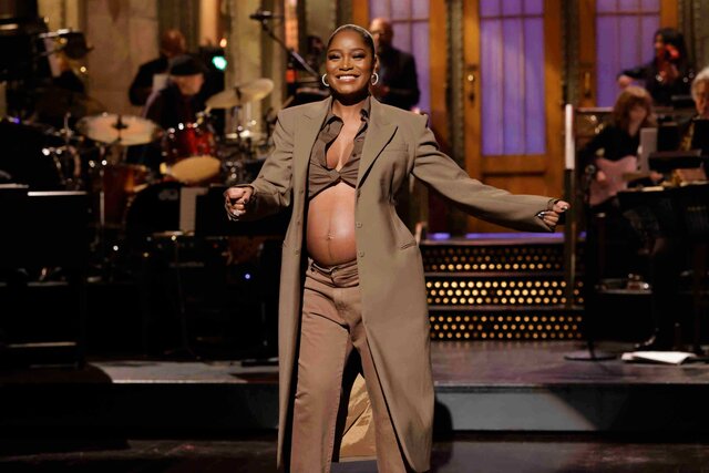 Keke Palmer showing off her pregnant belly during Saturday Night Live.