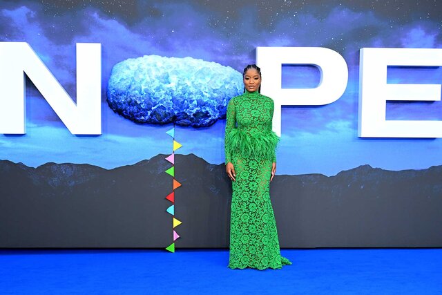 Keke Palmer appears at the UK premiere of Nope in a green gown.