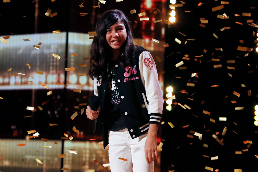 AGT 2022: A tearful Madison Baez stands onstage as gold confetti rains down around her