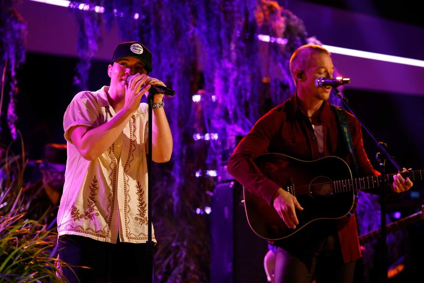 Lily Rose and Diplo performing on The Voice Finale.