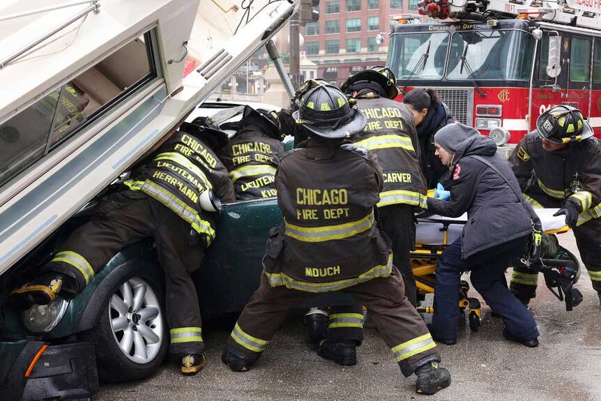 Firefighers from Firehouse 51 in a scene from Chicago Fire.