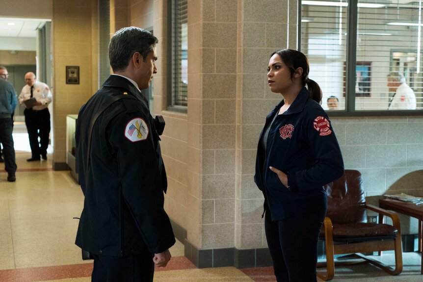 Gabby Dawson (Monica Raymund) and Karl Hatcher (Sam Porretta) appear in a scene from Chicago Fire.