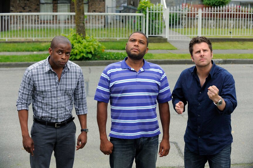 Gus Guster (Dule Hill), Thane (Anthony Anderson), and Shawn Spencer (James Roday) appear in a scene from Psych.