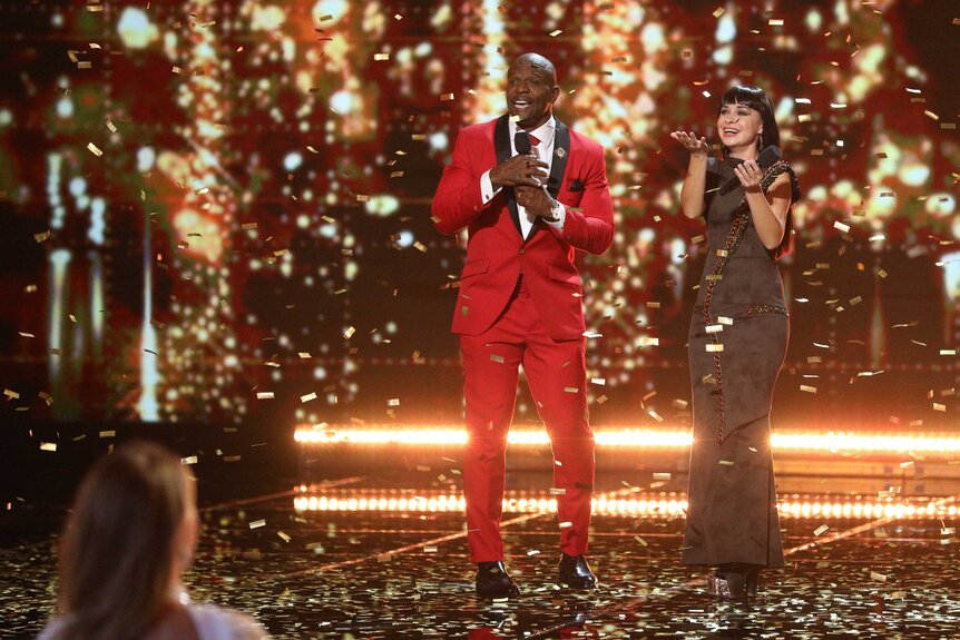 Kseniya Simonova receives the golden buzzer on America's Got Talent: The Champions.