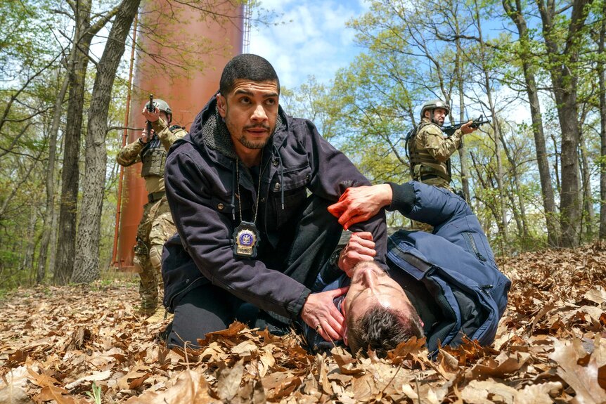 Detective Bobby Reyes (Rick Gonzalez) and Detective Jamie Whelan (Brent Antonello) in a scene from Law & Order: Organized Crime.