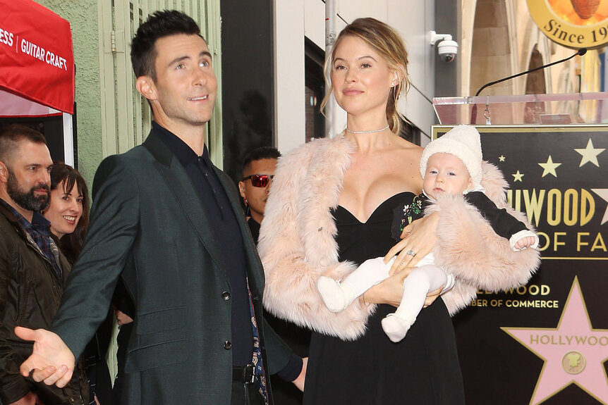 Adam Levine, Behati Prinsloo and Dusty Rose Levine are photographed together at his Walk of Fame ceremony
