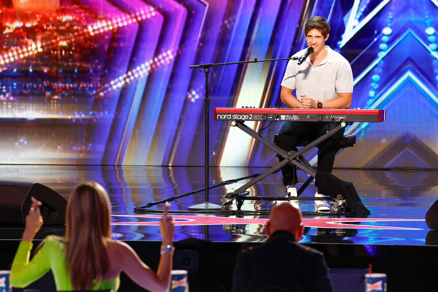 Trent Toney playing piano on the "America's Got Talent" stage