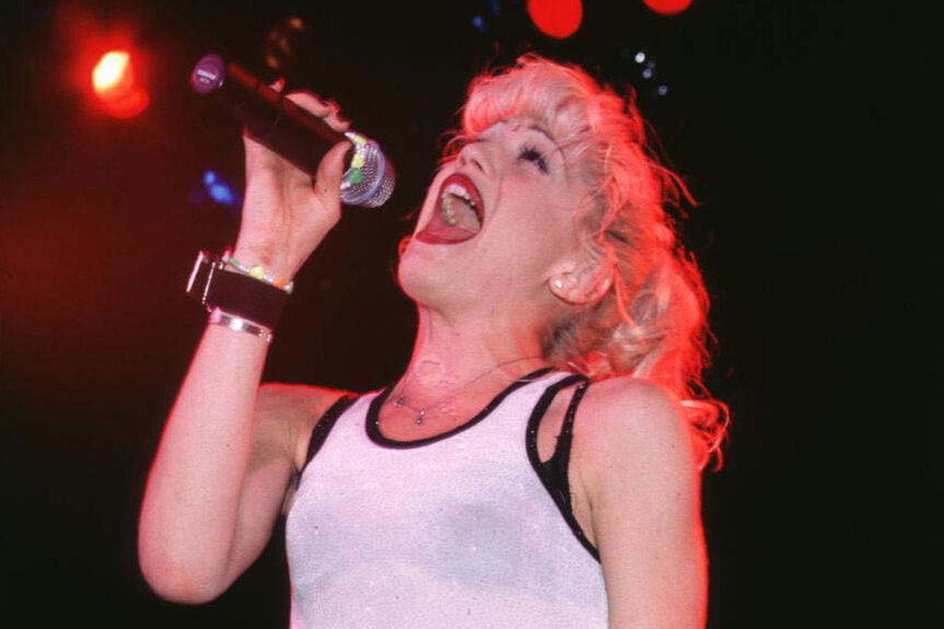 Gwen Stefani performing onstage in the 90s