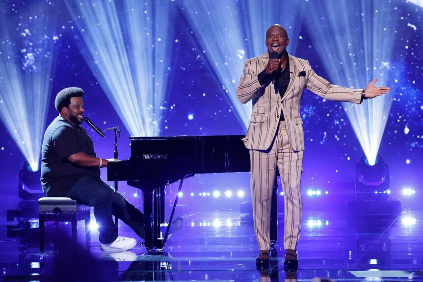 Craig Robinson and Terry Crews performing on America's Got Talent.