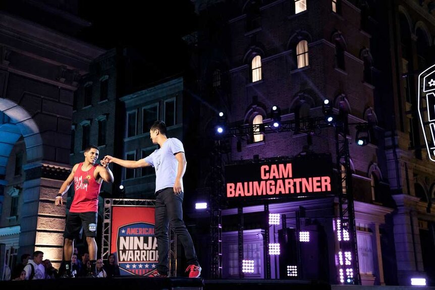 Cam Baumgartner and Tatsumi Yanaba competing on American Ninja Warrior.