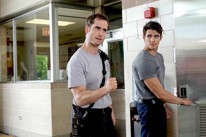 Danny Borrelli and Jimmy appear in a scene from Chicago Fire.
