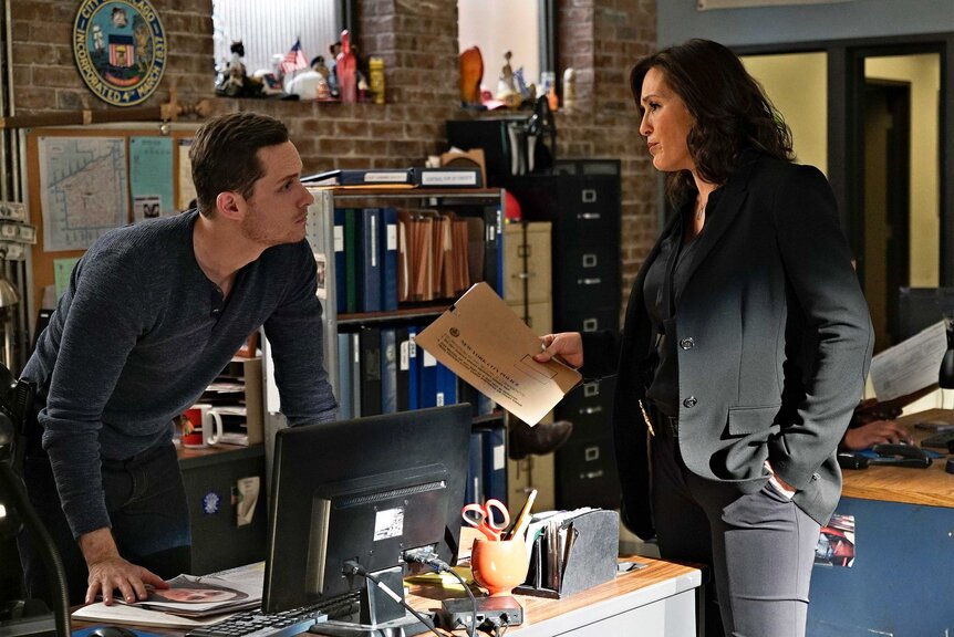 Jay Halstead and Olivia Benson appear during a scene in Chicago P.D.
