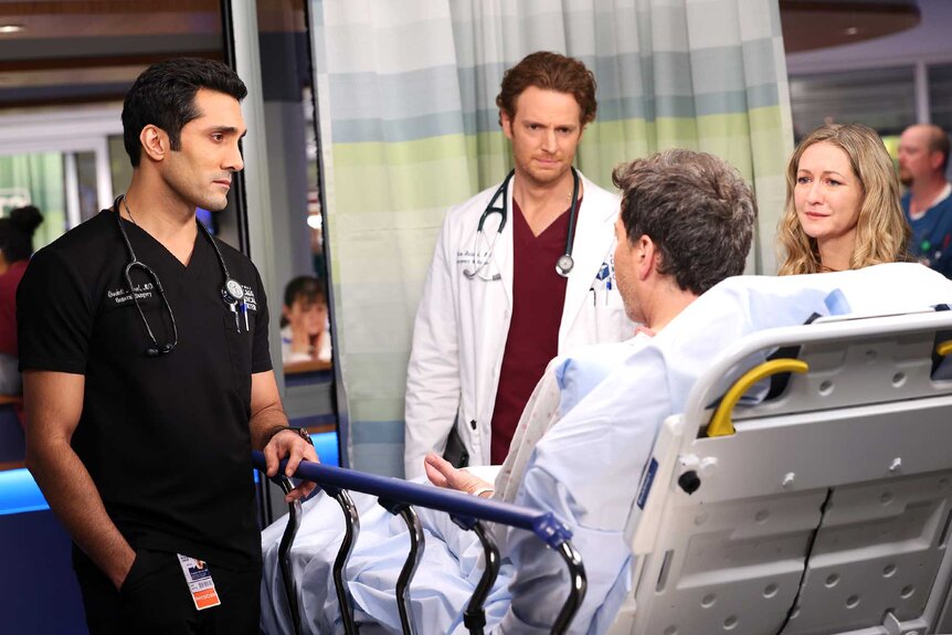 Crockett Marcel, Will Halstead, Richard Evans, Vickie Evans appear in a scene from Chicago Med.