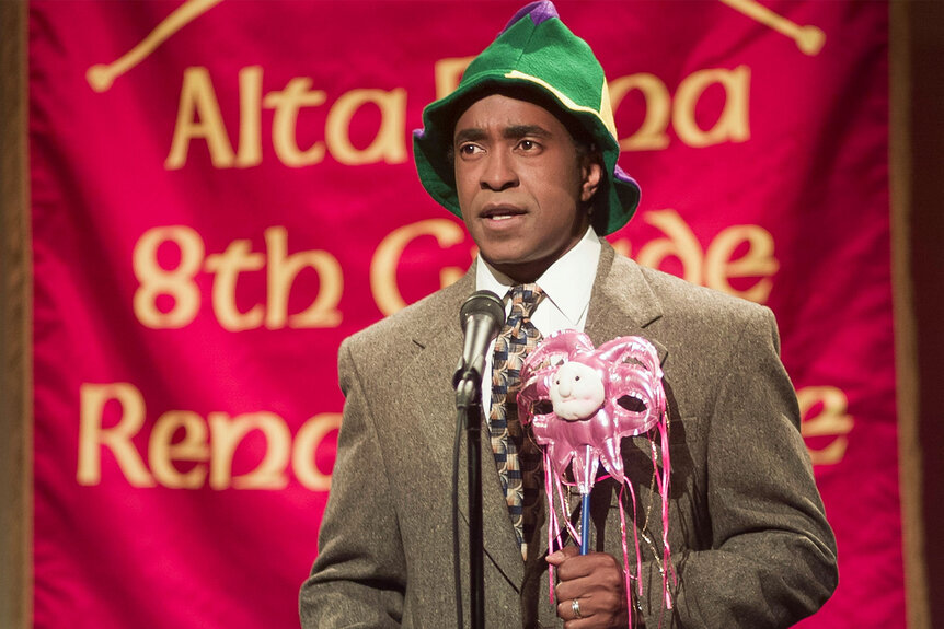 Tim Meadows wearing a green elf hat during a Saturday Night Live sketch