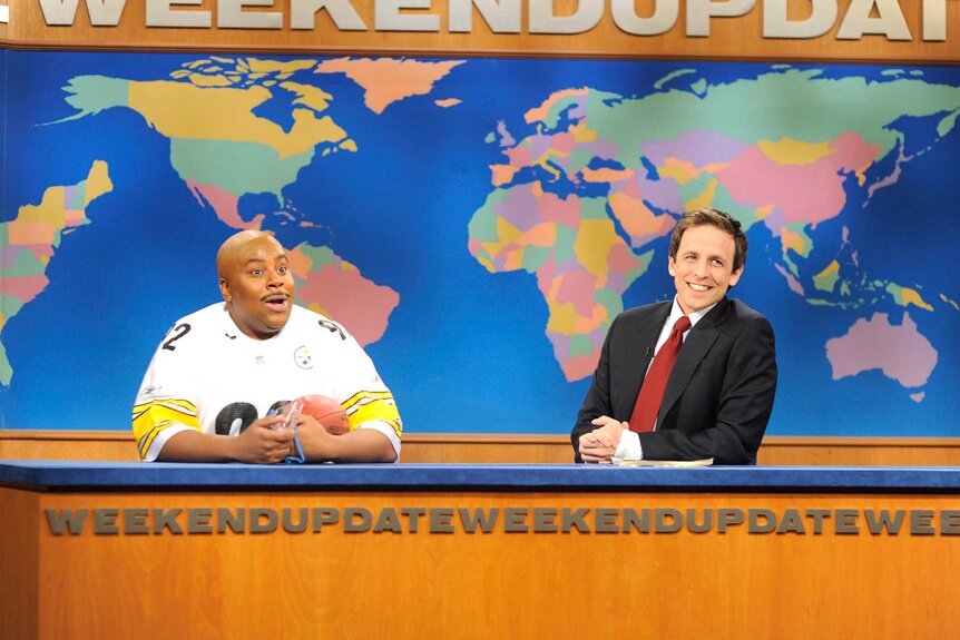 Kenan Thompson and Seth Meyers during the Weekend Update.