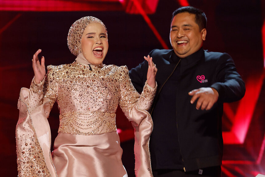 Putri Ariani stands on the America's Got Talent stage