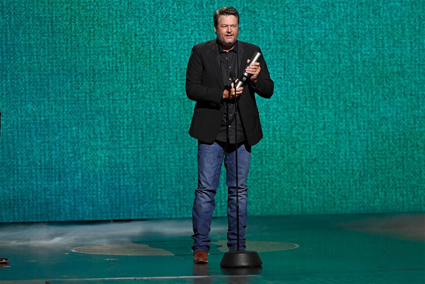 Blake Shelton accepts an award on stage during the Peoples Choice Country Awards