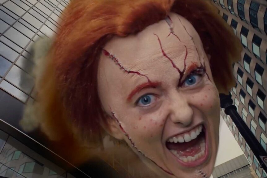 A close up of Sarah Sherman digitally altered as the character Chucky.