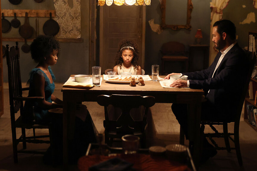 Teen Gabi, Bella, and Sir seated around a dinner table
