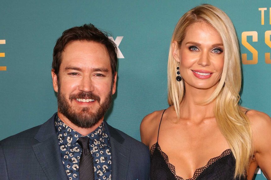 Mark-Paul Gosselaar and Catriona McGinn pose together for The Passage premiere party.