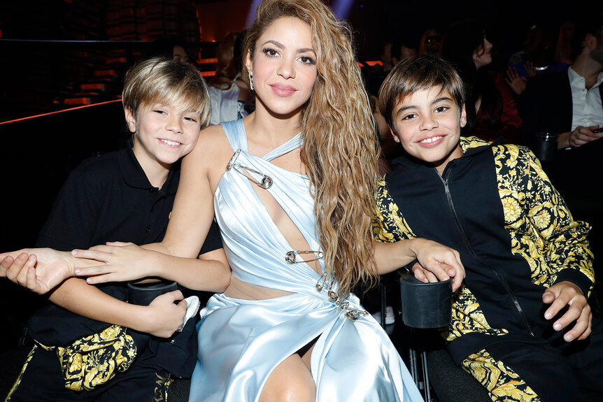 Sasha Piqué, Shakira, and Milan Piqué sit in the audience of the MTV Video Music Awards