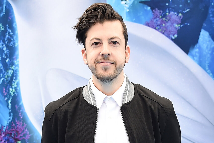 Christopher Mintz-Plasse arrives on the blue carpet for How To Train Your Dragon: The Hidden World