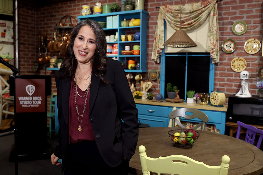 Maggie Wheeler poses for a photo in the Friends kitchen