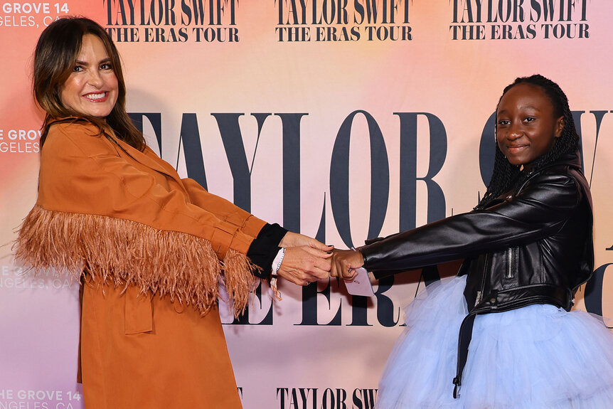 Mariska Hargitay and Amaya Hermann hold hands at the "Taylor Swift: The Eras Tour" Concert Movie