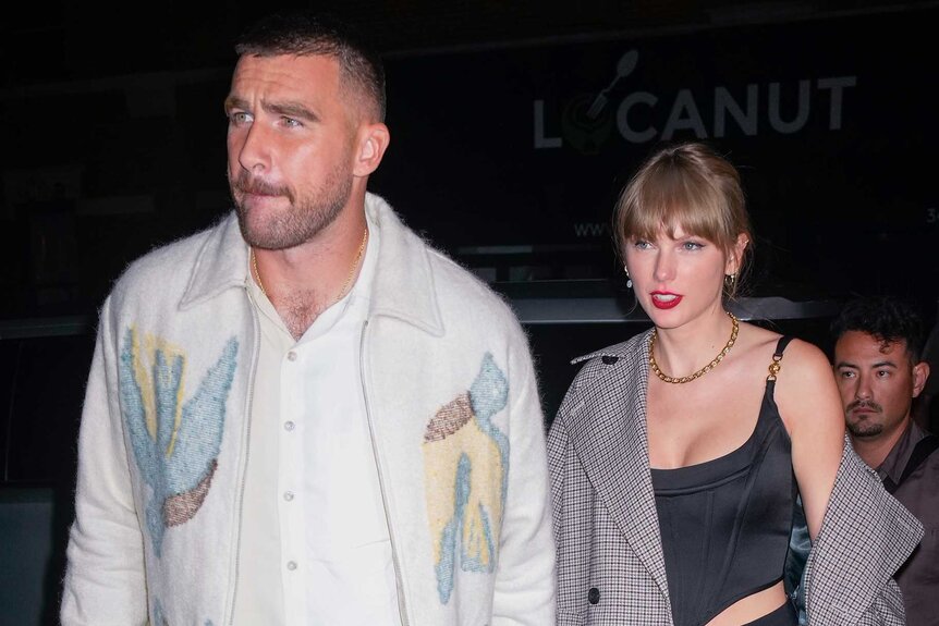 Travis Kelce and Taylor Swift hold hands as they walk into the Saturday night live after party