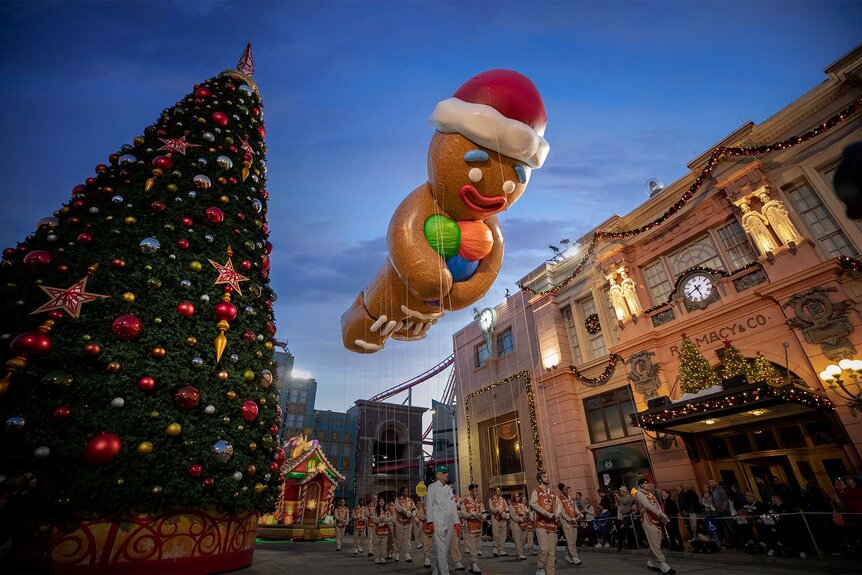 A gingerbread float during a parade at Universal Orlando